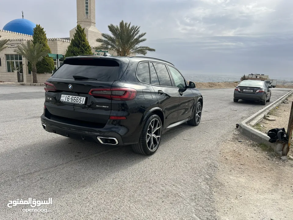 بي ام دبليو X5 لون اسود موديل 2022 Mكيت فل كامل فحص كامل وارد وكاله عمان