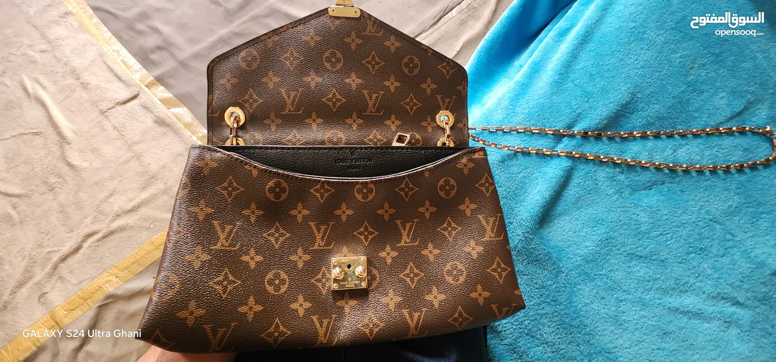 used lv bag and nine west bag