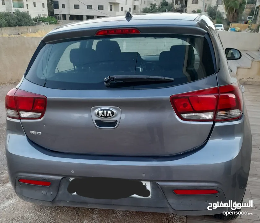كيا ريو رمادي اصل شركة 2019  للبيع  ماشية 65 فقط