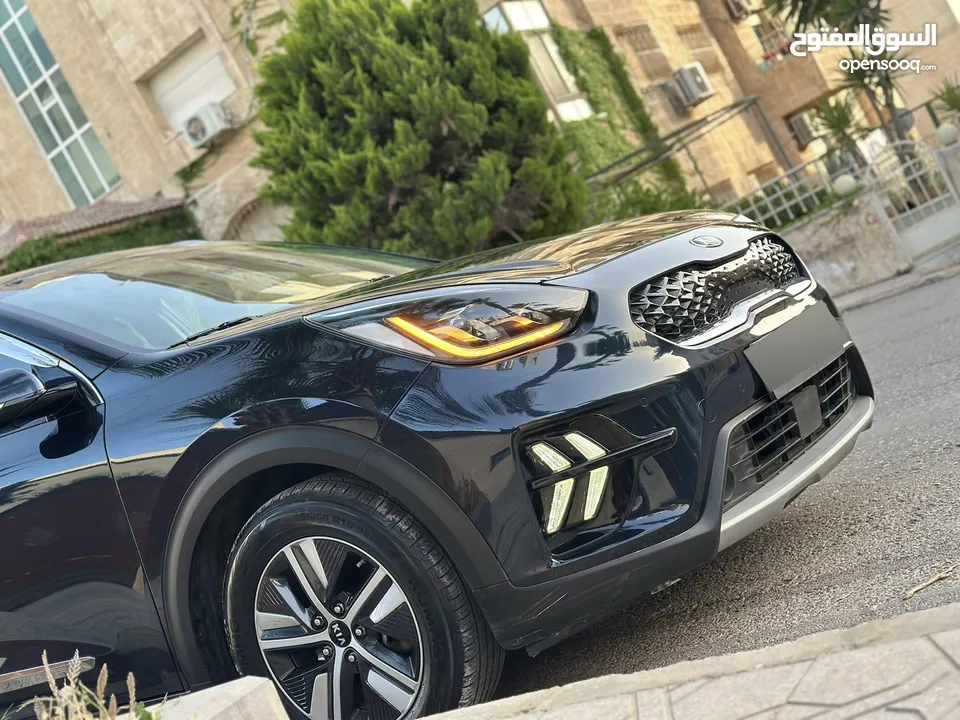 كيا نيرو هايبرد 2020 تورنج فل الفل كاش او اقساط غرفه مميزه لون خمري فتحه
