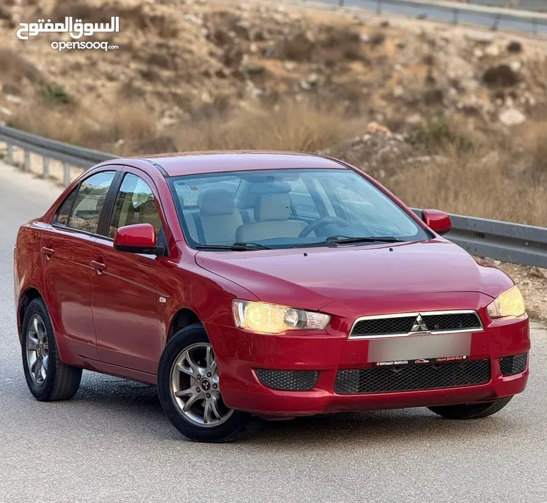 لانسر دفعه 18 وشكات 1350 فشهر 45 الف فقط فحص نخب اصل برايفت سياره بنايلون