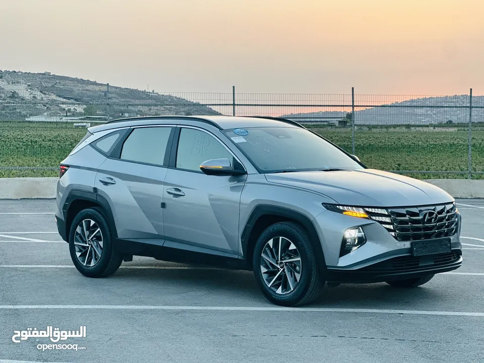 هونداي توسان 2022 فل بدون فتحة سقف  2x4 ///240Hp بنزين + كهرباء  ( Haybrid) 1600cc