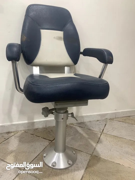 East Sun marine captain chair with adjustable stand  sold as seen ,slight marks on the leather