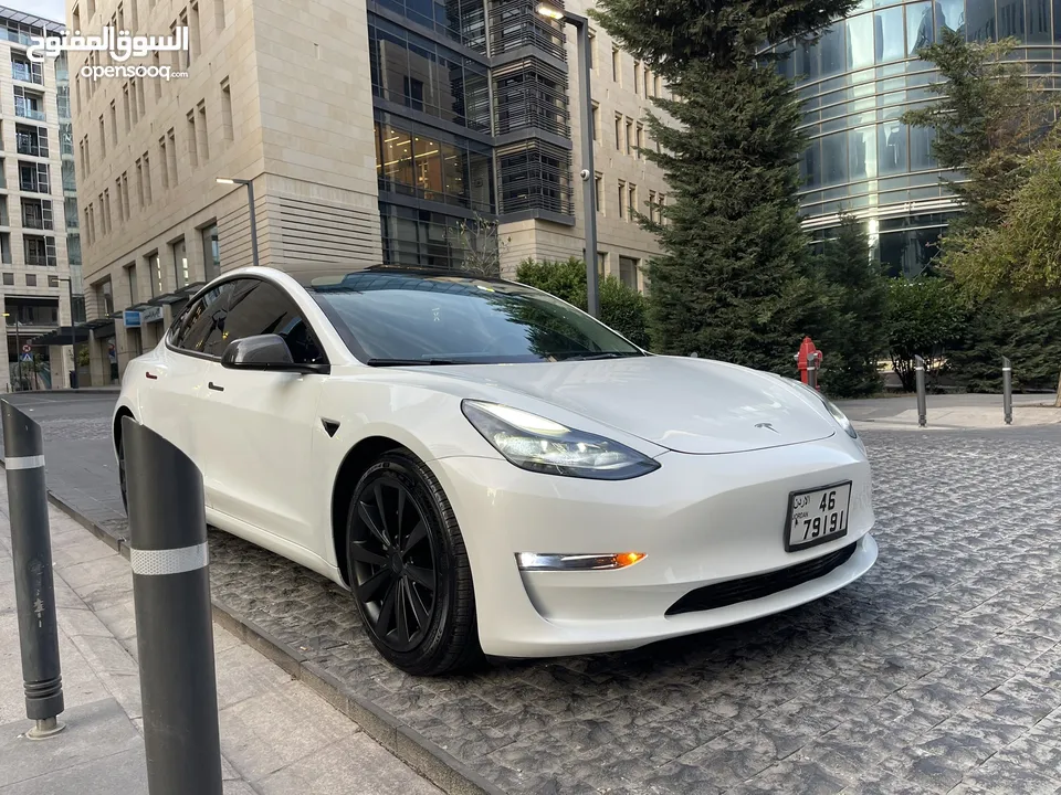تسلا لون ابيض جمرك اليوم 2023