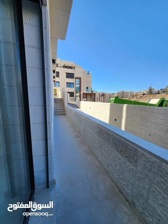 شقة طابقية فاخرة للبيع في عبدون  ref : 14383
