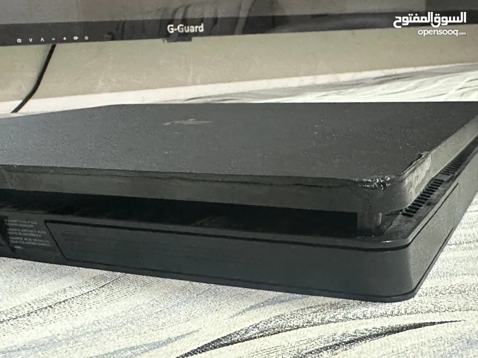 PS4 slim بلايستيشن 4 سليم مع العاب كثيره مثل gtav fifa20 fifa21 والكثير