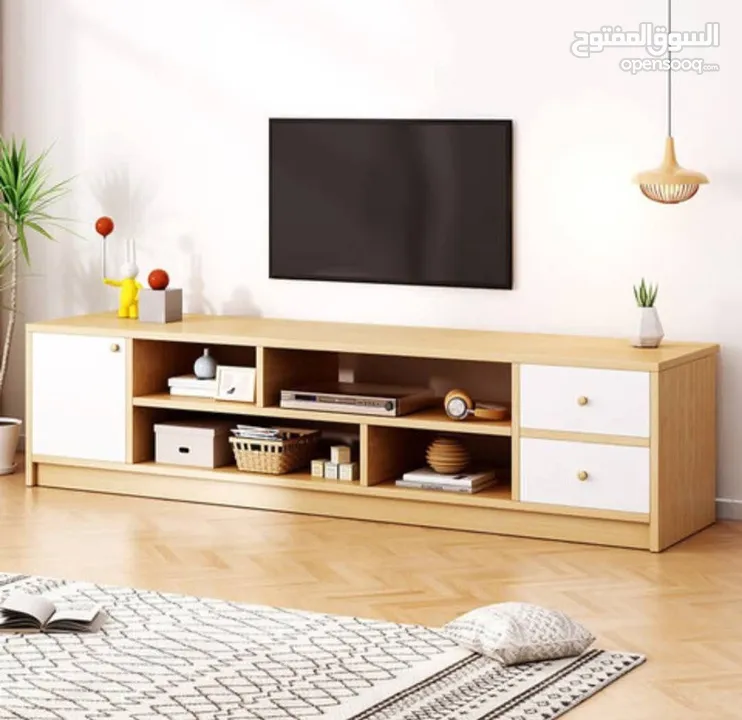 طاولة تلفزيون بلون أبيض وخشبي بتخطف الأنظار! المقاس 160*30*40 سم تصميم مودرن وعصري