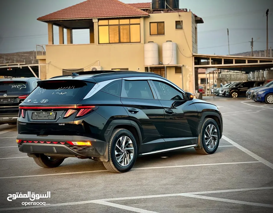 هونداي توسان/2022 فل الفل فتحة سقف بانوراما  2x4 ///240Hp بنزين + كهرباء  ( Haybrid) 1600cc