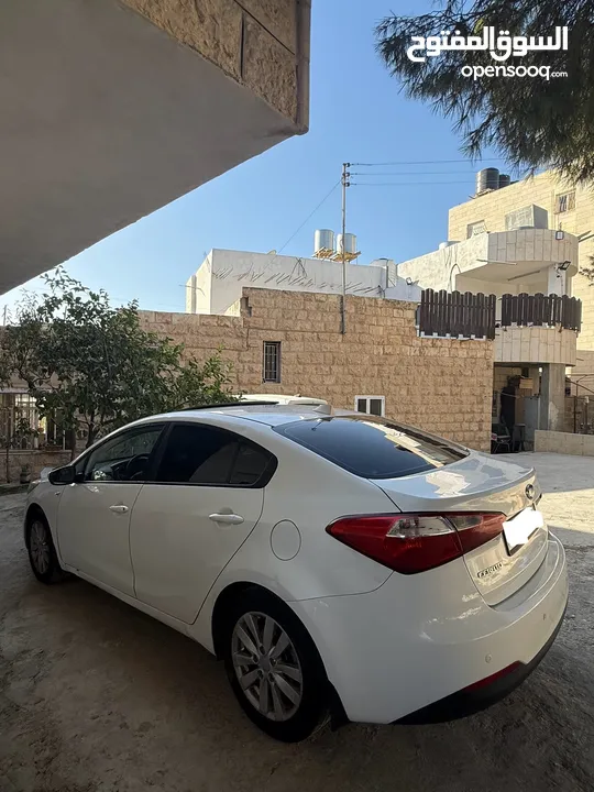 كيا k3 سيراتو 2014 مع فتحة سقف نخب بنزين