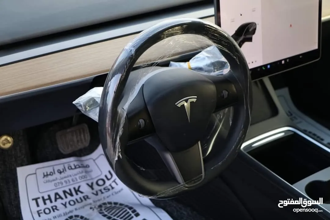 Tesla model 3خمري ميتلك 2023