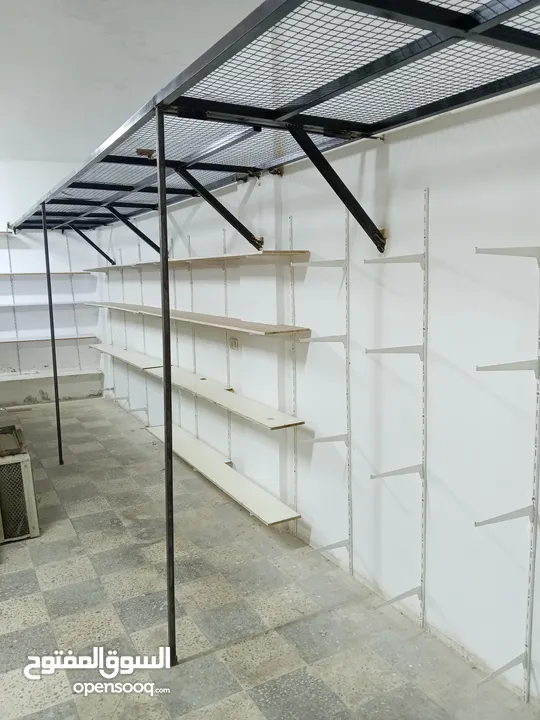 رفوف  محل سوبر ماركة ابواب