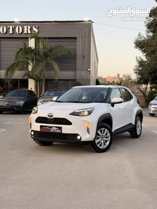 تويوتا ياريس كروس ترخيص 2022 محرك 1500 هايبرد جير أوتوماتيك 172 حصان