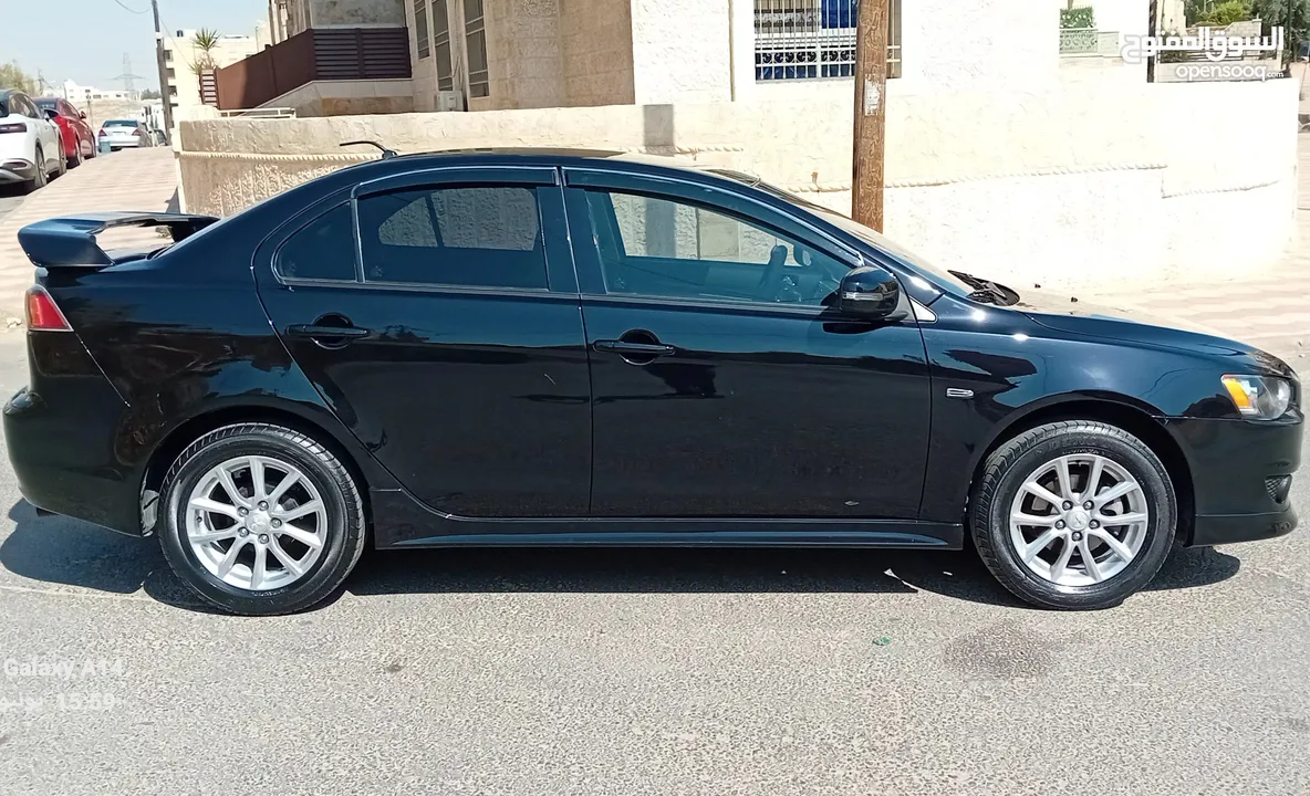 متسوبيشي لانسر فراشة موديل 2015 فحص مرفق مع الصور بحالة الوكاااااالة  ماشية 49 الف km  أصلي