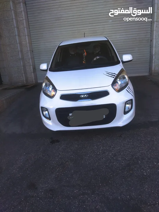 كيا مورنينج 2016 لون ابيض عاجي