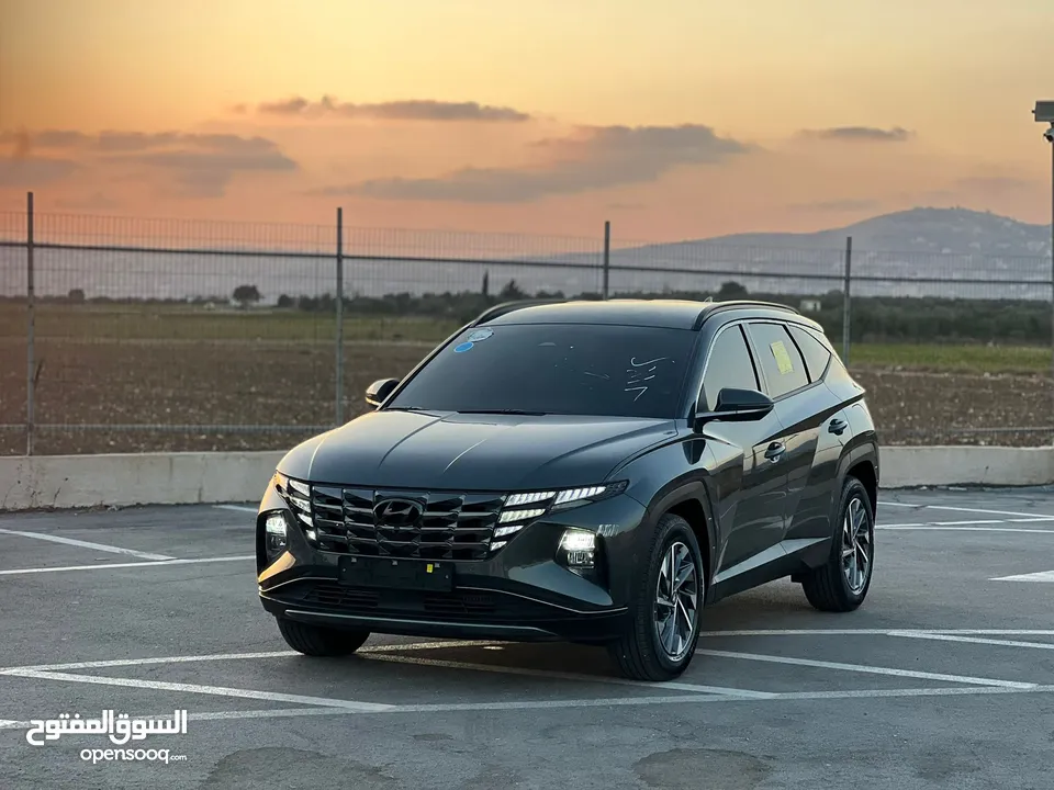 هونداي توسان/2022 فل الفل بدون فتحة سقف  2x4 ///240Hp بنزين + كهرباء  ( Haybrid) 1600cc