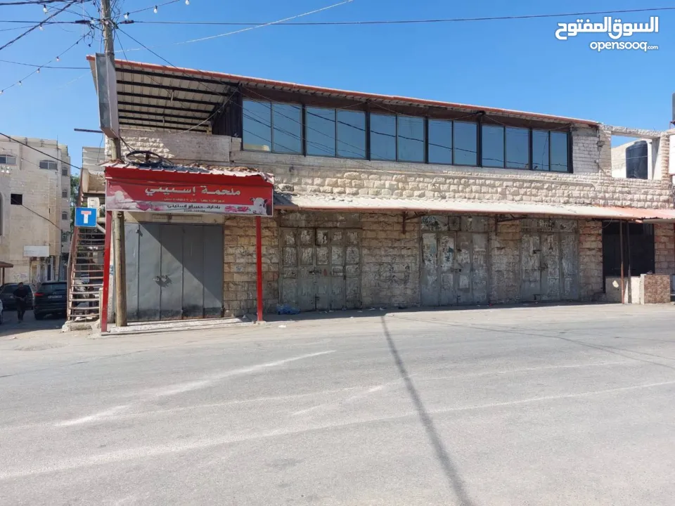 بيع محلات ومنزل