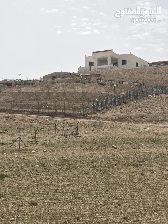 أرض على شارع المية ممر عمان التنموي للبيع