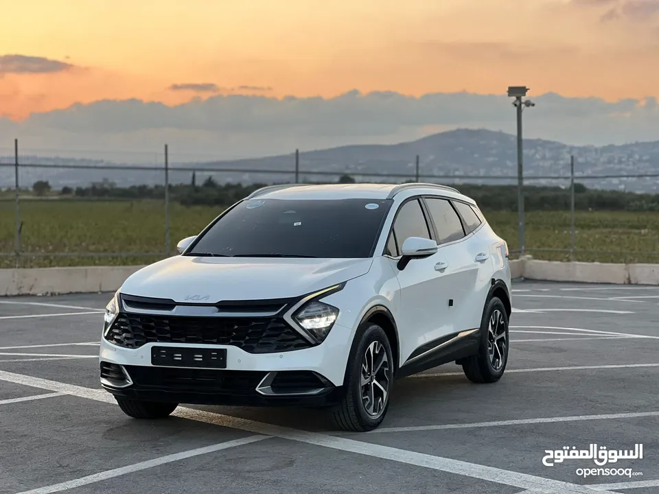 كايا سبورتاج /2022 فل بدون فتحة سقف  2x4 ///240Hp بنزين + كهرباء  ( Haybrid) 1600cc