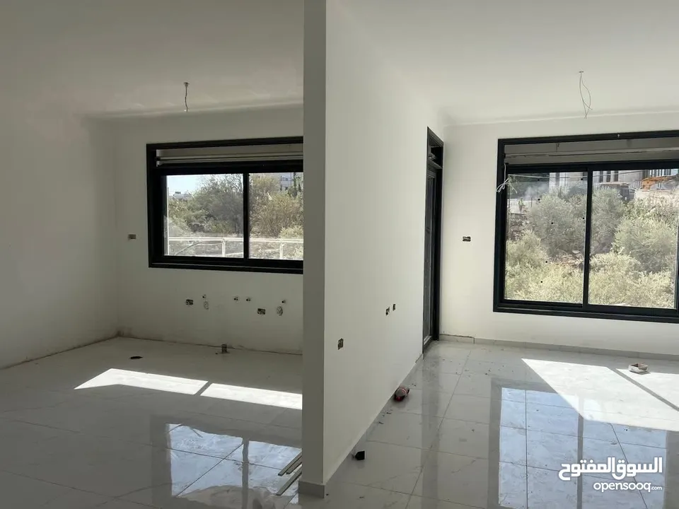 شقه للبيع في سطح مرحبا قرب ترست للتأمين