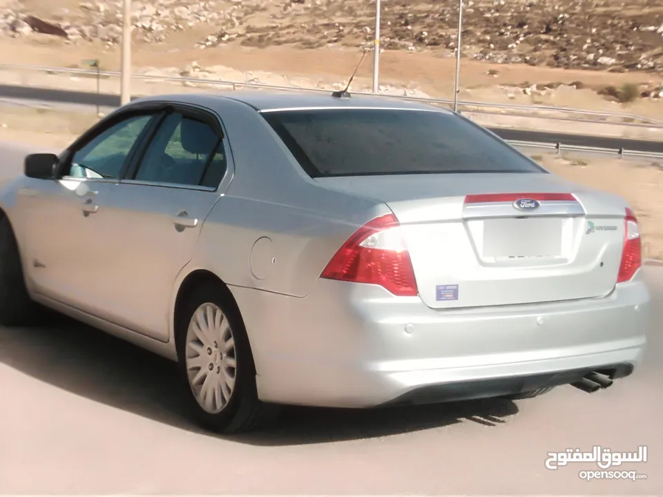 فورد فيوجن 2010 هايبرد  فحص مرفق بالصور الاضافات : - نظام SYNC - سعة المحرك cc 2500 قوي جدا واقتصادي