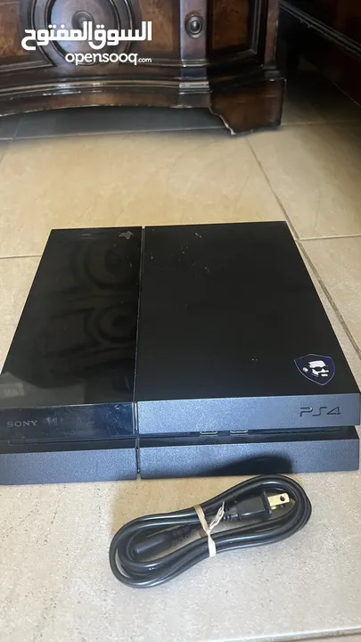 PlayStation 4 with 9 games 4 controllers and 2 chargers and 2 headsets for sale in a cheap price