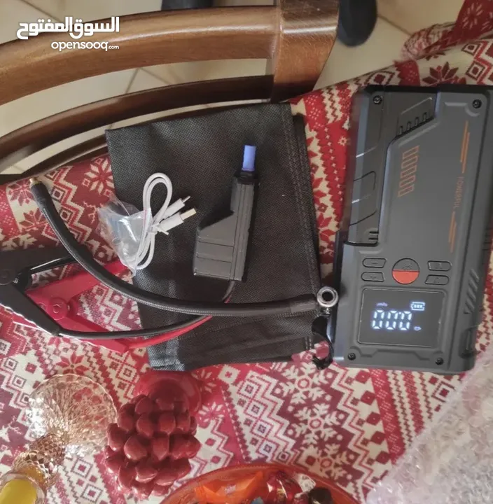 مكثف طاقة ( Jump starter ) لشحن بطارية السيارة بالإضافة إلى القدرة على نفخ العجال