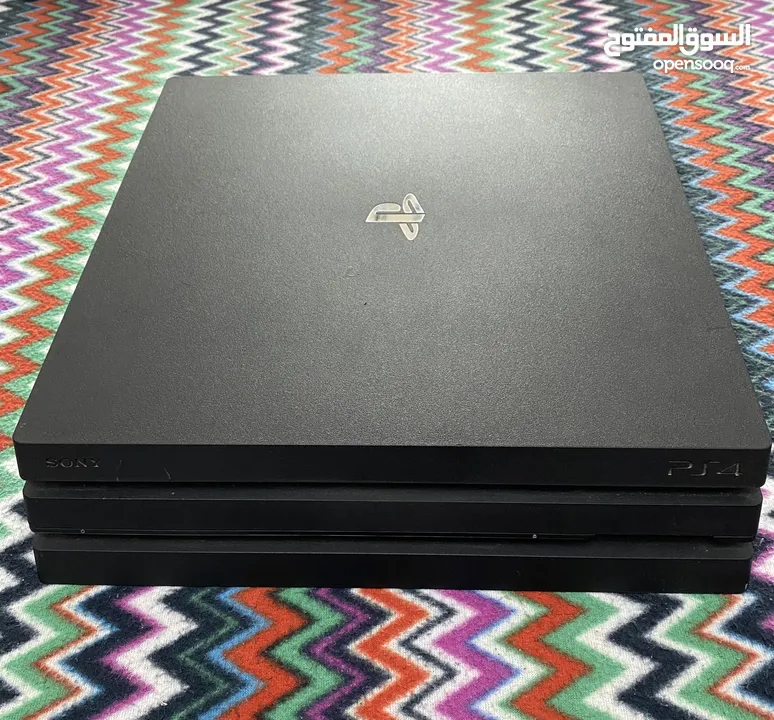 PS4 Pro 1TB with 3 controllers and 9 games