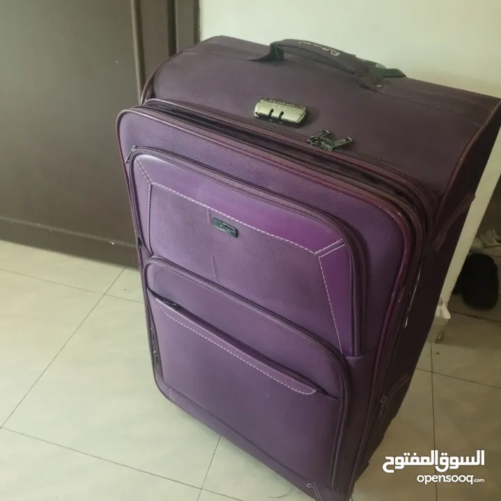 شنتة سفر جر لون بنفسجي غامق حجم كبير