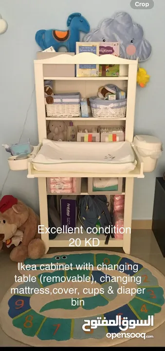 Ikea cabinet with changing Table (removable), changing mattress, cover, cups & diaper bin