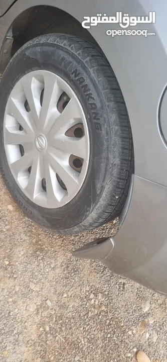 new insurance new tire Nessan Versa 2014