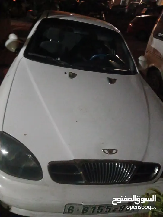 دايو لانوس نظيفة 2001 لونها أبيض للبيع