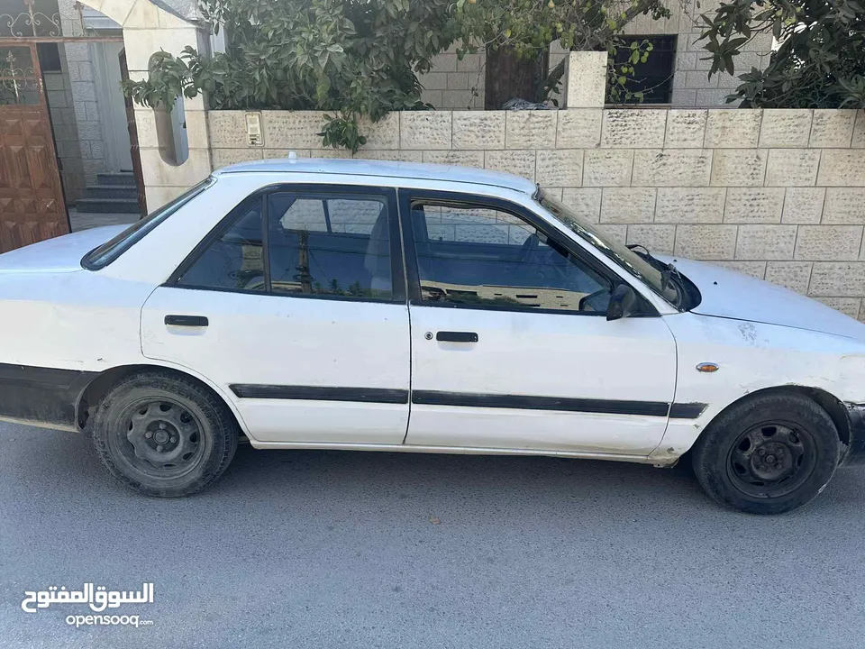 مازدا سوداني 323