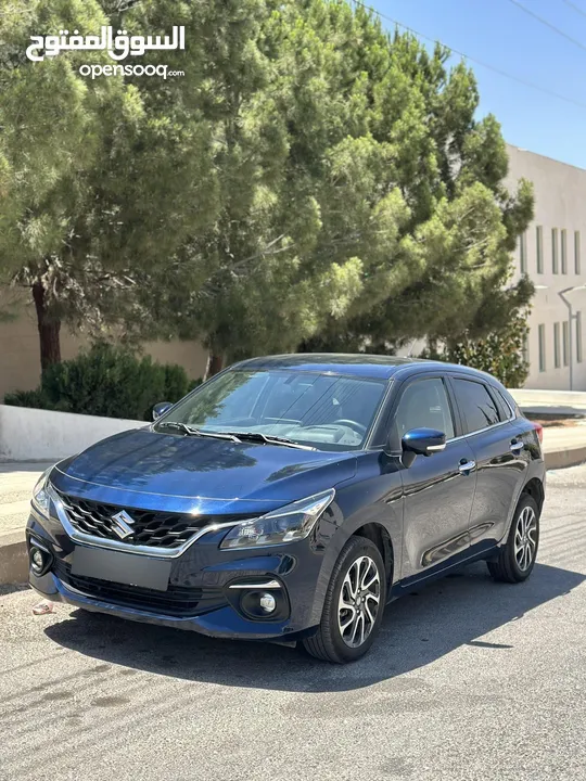 Suzuki Baleno 2023  ما زالت تحت كفالة الشركة قاطعة مسافة 9000 فقط