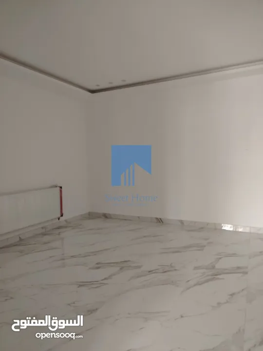 شقة أرضية فاخرة للبيع في خلدا  - خلف المستشفى السعودي 330م مع حديقة وترسات 100م لم تسكن