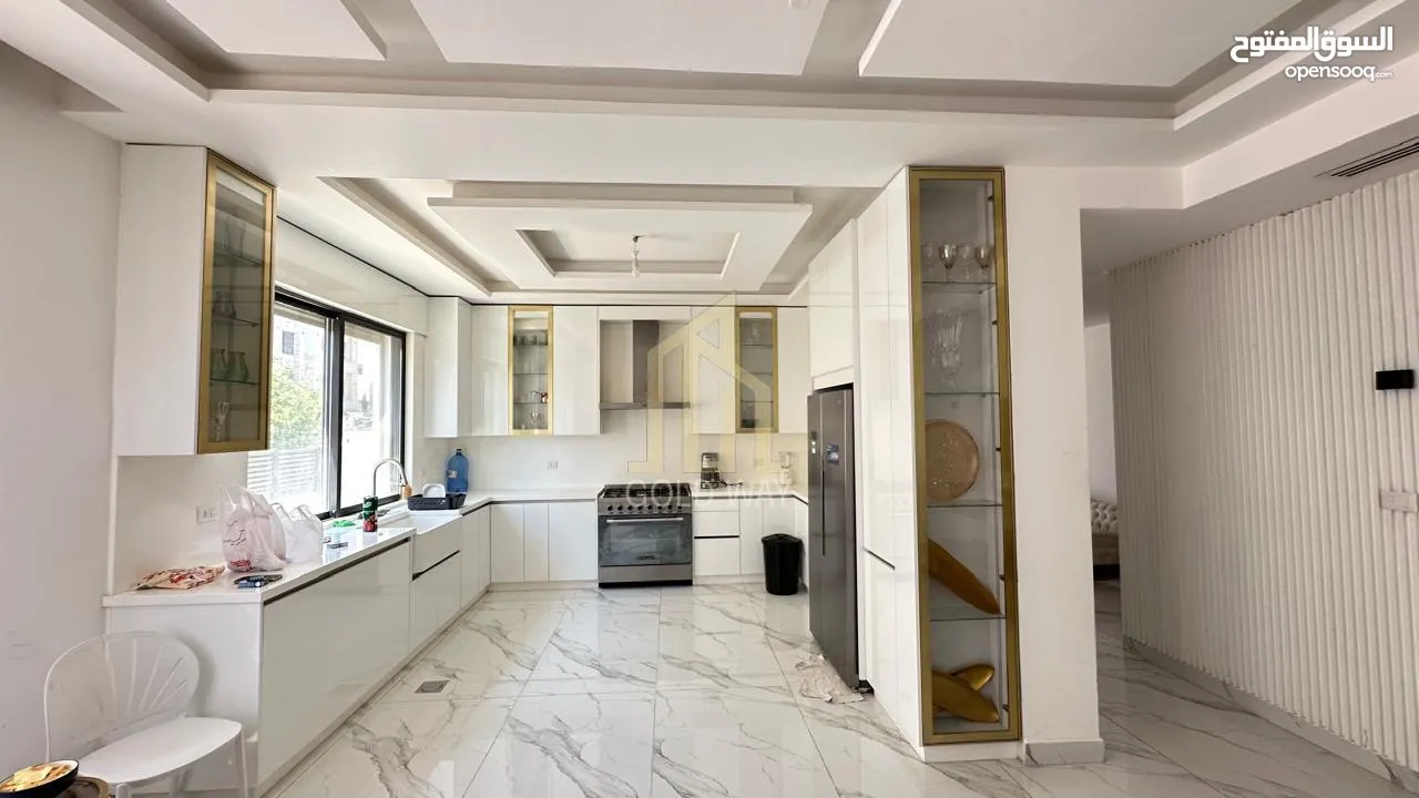 في أجمل مناطق الرابيه شقة أرضيه 196م مع ترس 50م بتشطيبات راقية / ref 9547