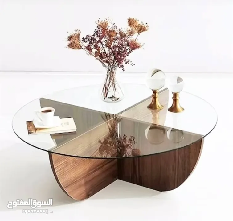 طبلة وسطيه بتصميم عصري مميز  سطح زجاج والقاعده خشب ثقيل   #لون ابيض واسود وجوزي