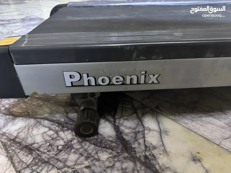 جهاز جري كهربائي ماركة فوينكس مع جهاز تكسير دهون
