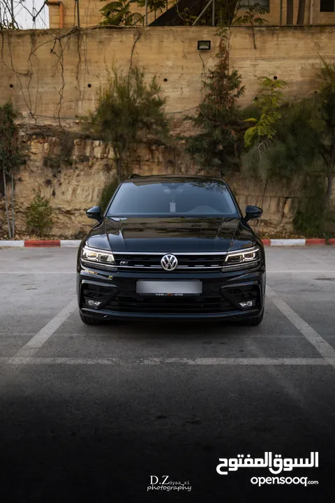 VW TIGUAN R_LINE  2000CC GASOLINE  4X4  امكانية البيع بدفعة اولى والباقي لغاية 4سنوات =48 شهر
