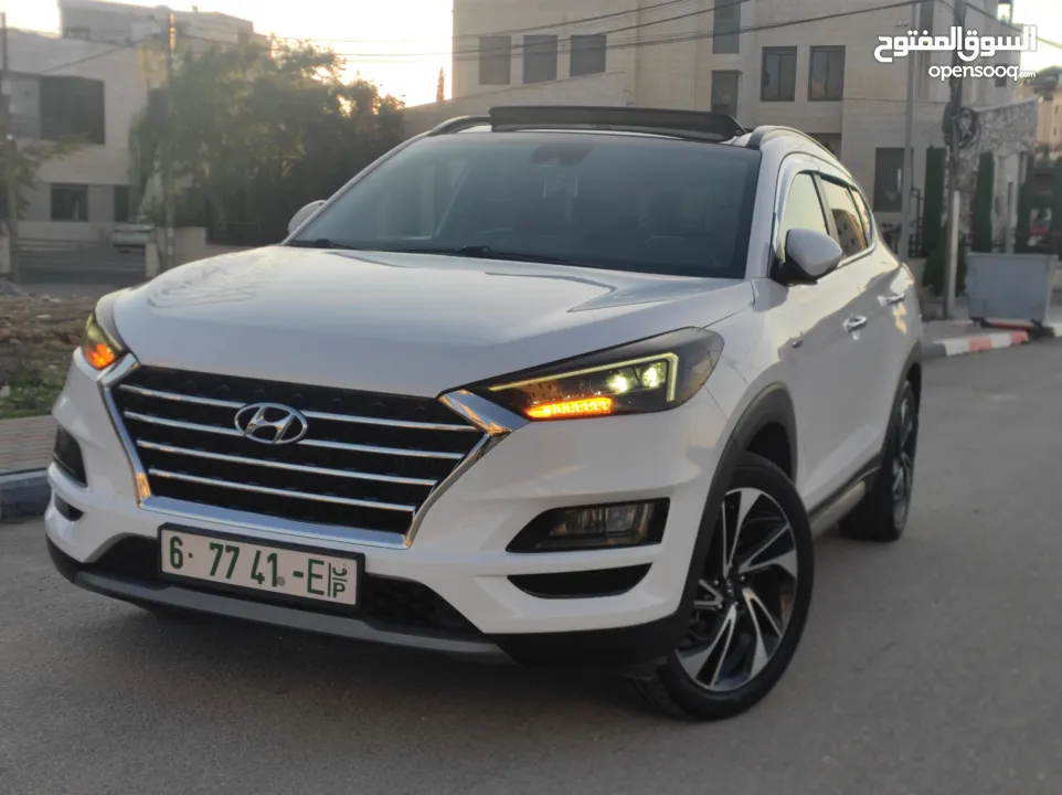 هونداي توسان فل الفل اضافات دهان شركة وعداد أصلي 70000كم فقططط رخصة وتأمين شامل للبيع بسعر مغري