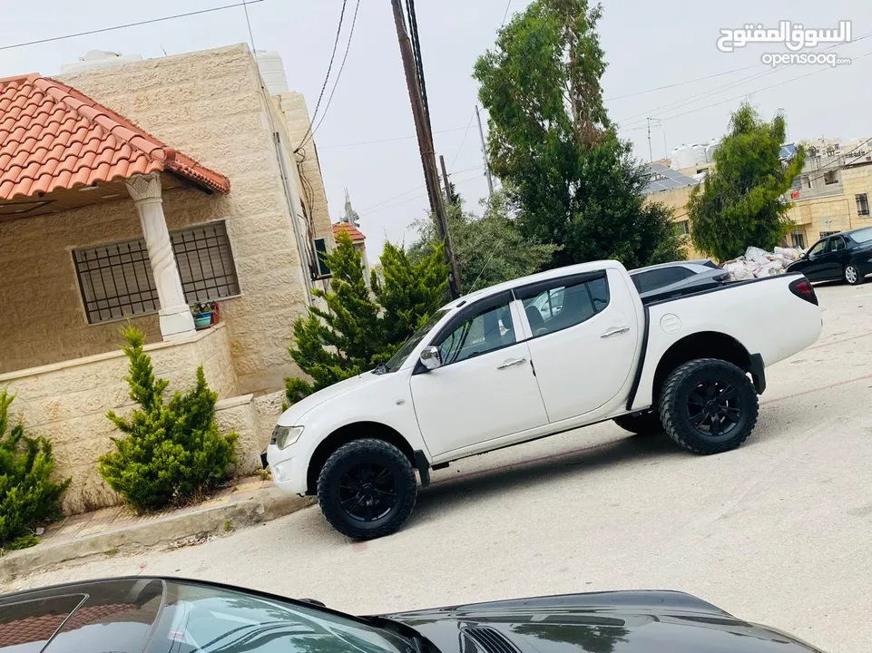 ميتسوبيشي L200 2011 + قطع