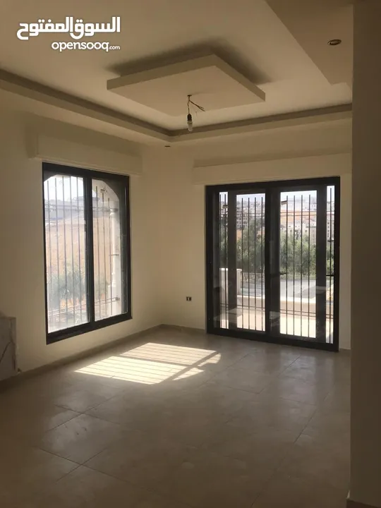 شقة للايجار أرضية فارغه بعبدون-13808
