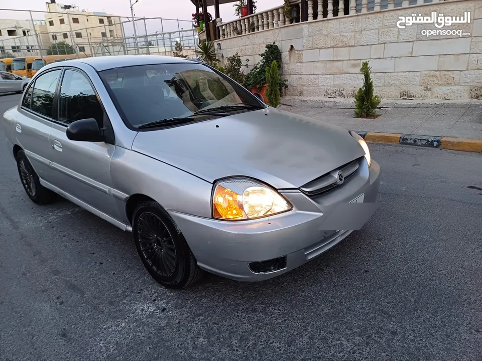 كيا ريو موديل 2003 جيرو اوتوماتيك