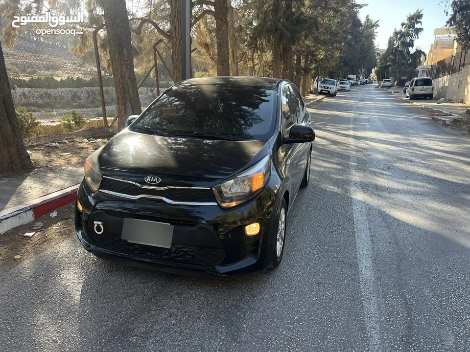 سيارة للبيع كيا مورننغ باللون الاسود المميز ،،،، سعر مغري ع الكاش
