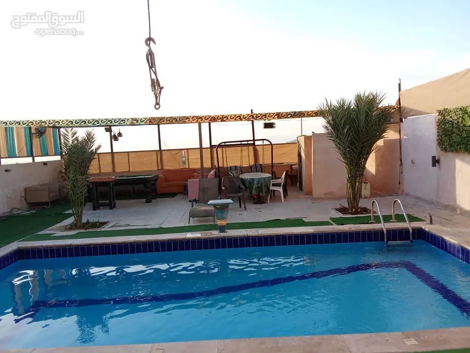 شاليه للايجار منطقه مطله جبل الروضه مطل ع البحر الميت وجبال فلسطين مسبح مغطى من اشعه الشمس