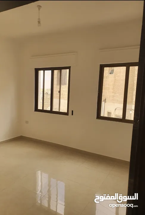 عماره جديده/4 شقق طابقيه للبيع