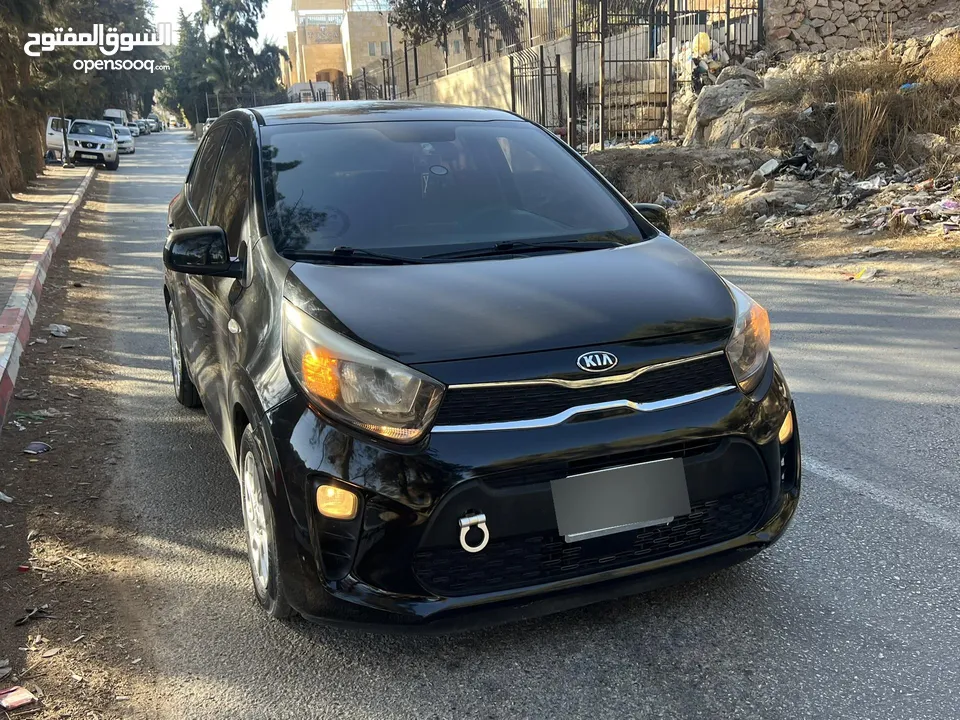 سيارة للبيع كيا مورننغ باللون الاسود المميز ،،،، سعر مغري ع الكاش
