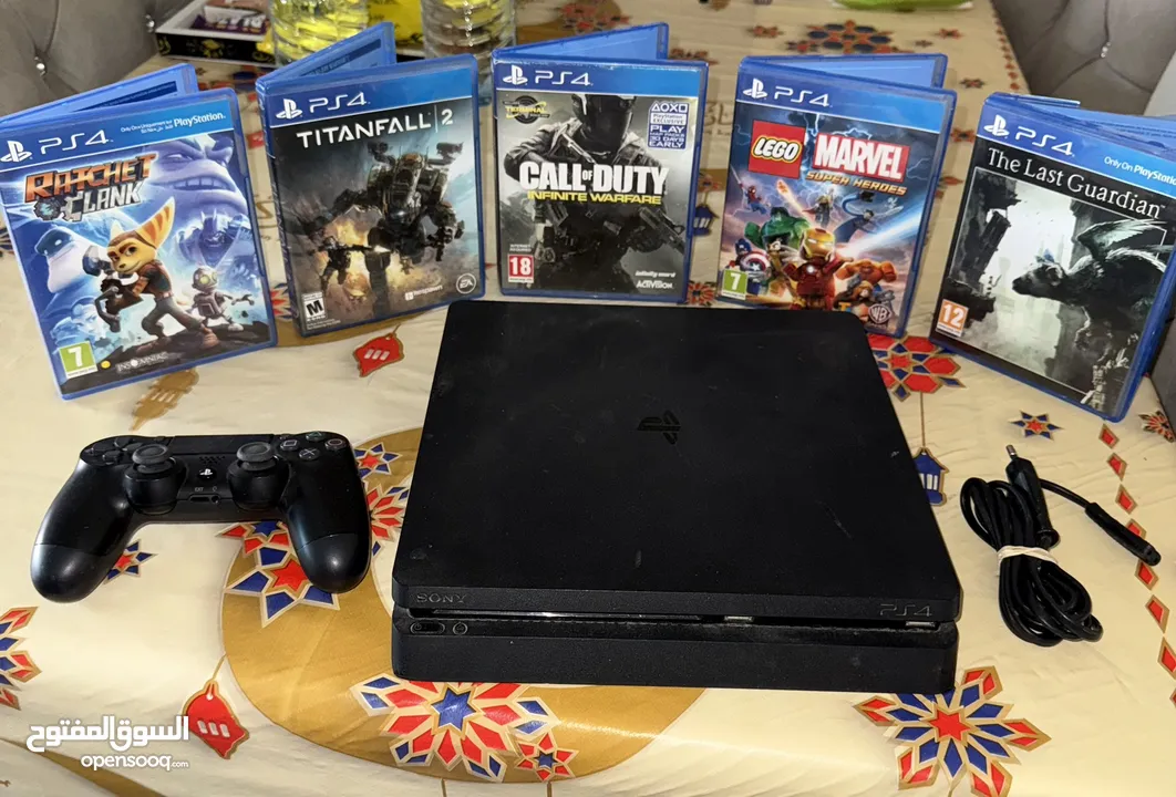 PS4 slim مع ايد اصليه و ألعاب