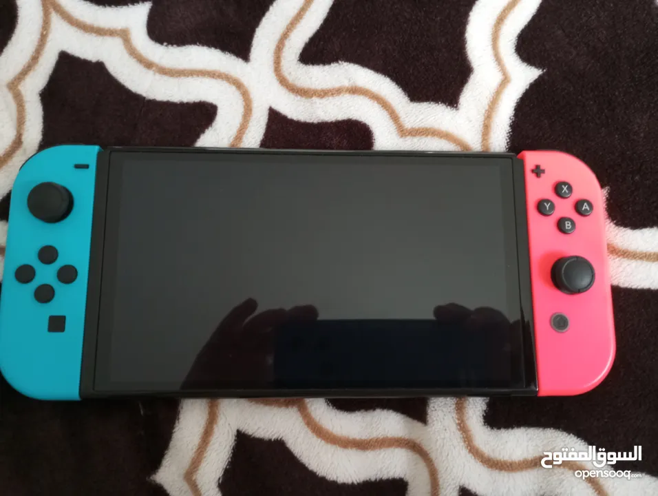 نينتندو سويتش  Nintendo Switch Oled بحالة الجديدة تحت الضمان  1100 شيكل