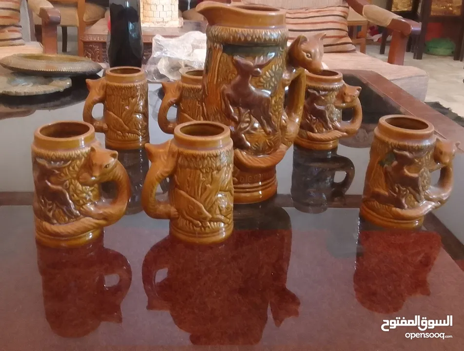 طقم كاسات فخار قديم للبيع بسعر ممتاز  الطقم مكون من سبع قطع و حالتو ممتازة