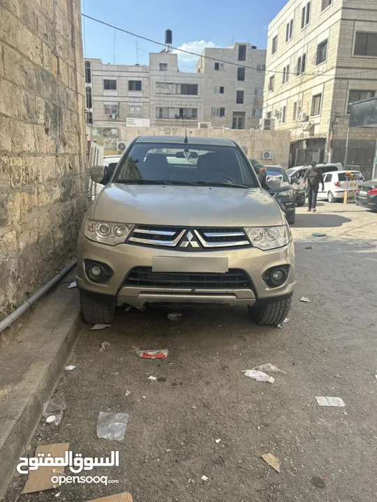 تندر متسبيشي L200 دفع خلفي 4x2 الحالة نظيف و السعر قابل لتفاوض مطور قير نظاف نظاف